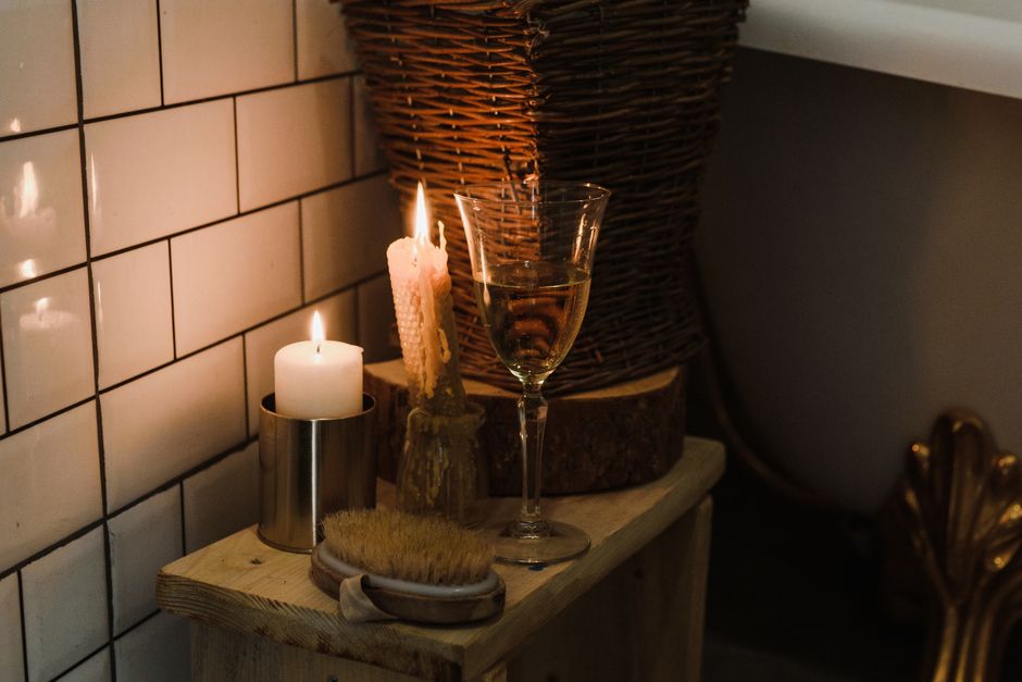 Softly lit home bathroom in the evening, showing how a smart toilet makes nighttime trips easier